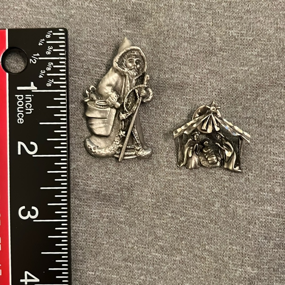 Pewter Santa and nativity brooches